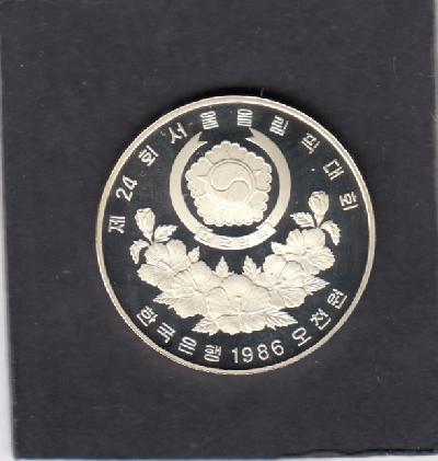 Beschrijving: 5000 Won S-OLYMPIC 88 ROPE PUL.